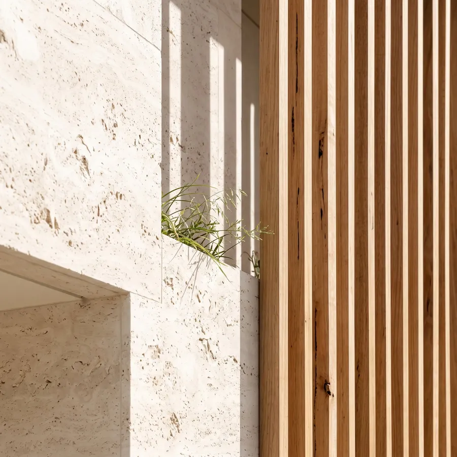 Close architectural detail of stone and light
